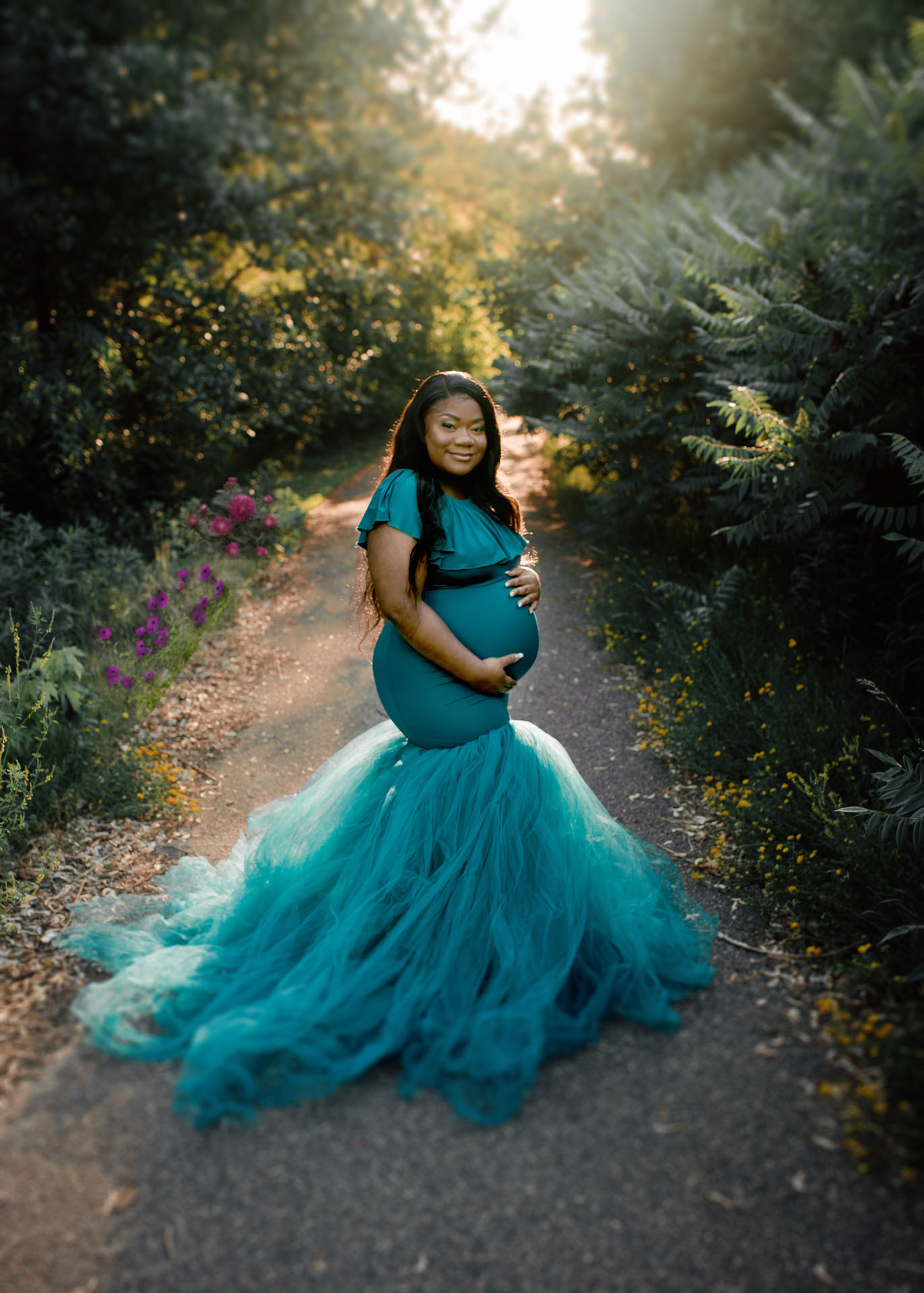 mom in teal tulle gown on forest trail kona Hawaii big island maternity photographer
